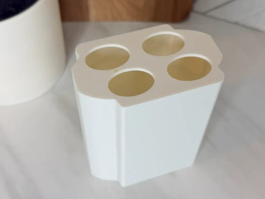TOOTHBRUSH HOLDER INSERT