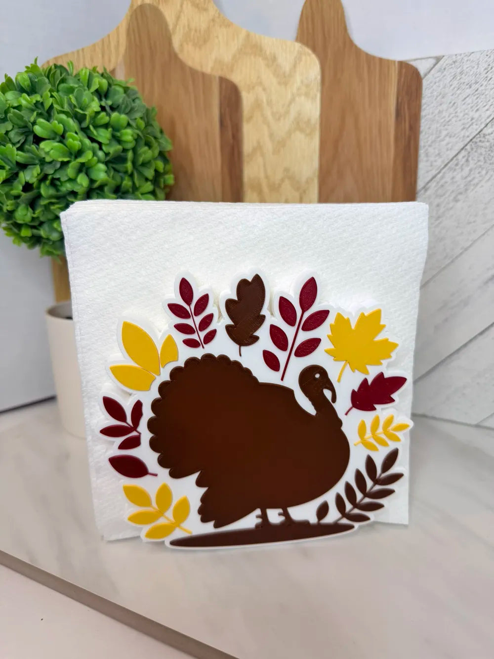 INTERCHANGEABLE NAPKIN HOLDER